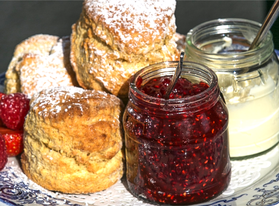 Homemade scones with raspberry jam